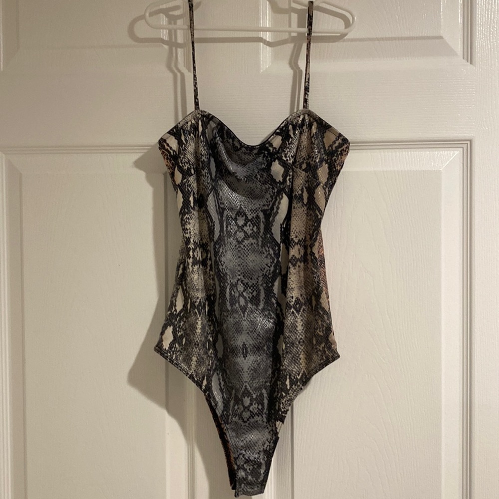 Blue Blush animal print body suit size small